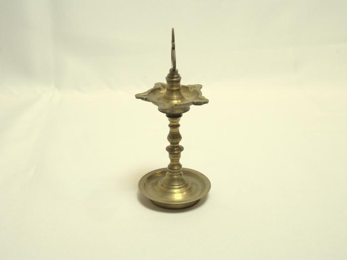 [Kuttuviḷakku = Ornamental brass lamp]