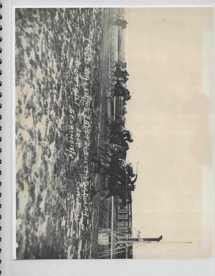 [Photo of Lou Gallator on a race track]