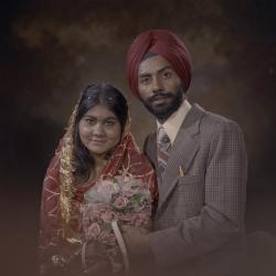 [Photo of Manjit Sidhu and the wedding guests]