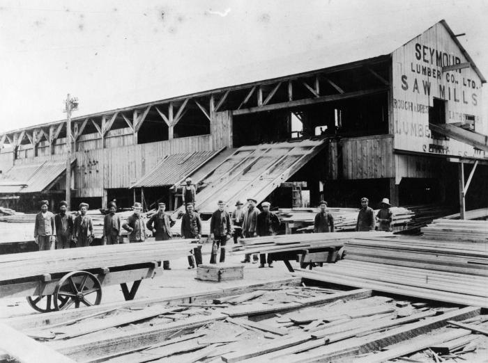 [Photo of sawmill workers at Seymour Lumber Company in North Vancouver]