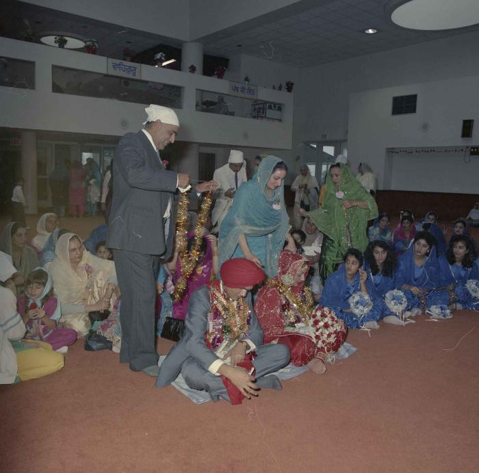 [Photo of Jaz Brar, Manpreet Brar and wedding guests]