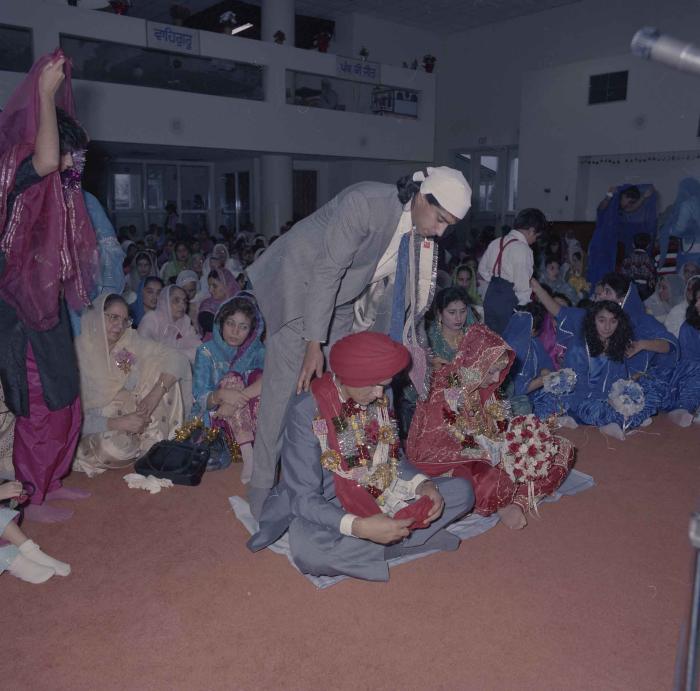 [Photo of Jaz Brar, Manpreet Brar and wedding guests]