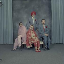 [Group photo of Kerneil Sidhu and wedding guests]