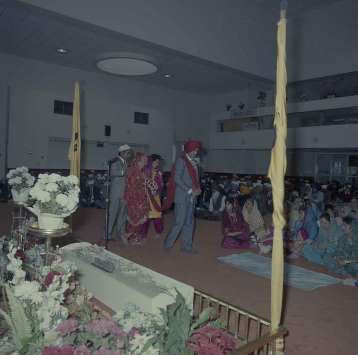 [Photo of Jaz Brar, Manpreet Brar and wedding guests]