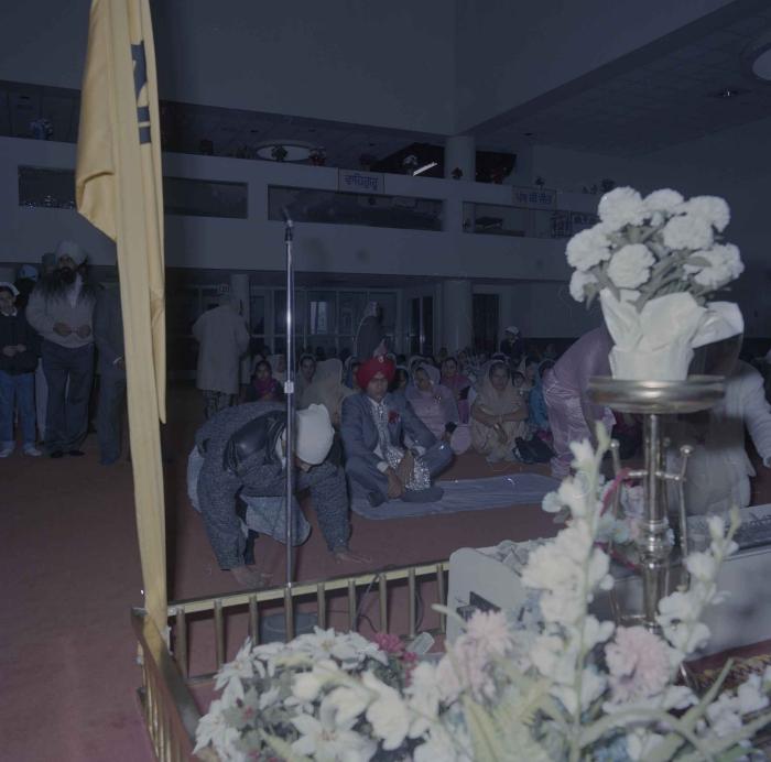 [Photo of Manpreet Brar and wedding guests]