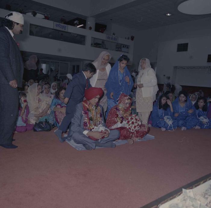 [Photo of Jaz Brar, Manpreet Brar and wedding guests]