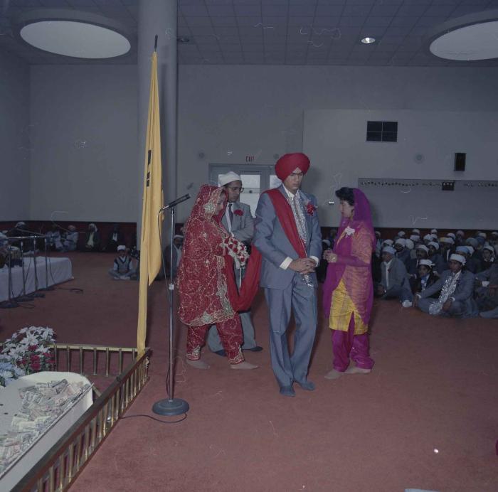 [Photo of Jaz Brar, Manpreet Brar and wedding guests]