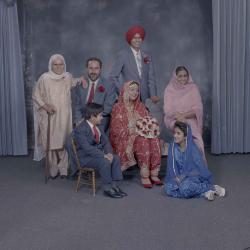 [Group photo of Kerneil Sidhu, Gurdev Sidhu and their wedding guests]