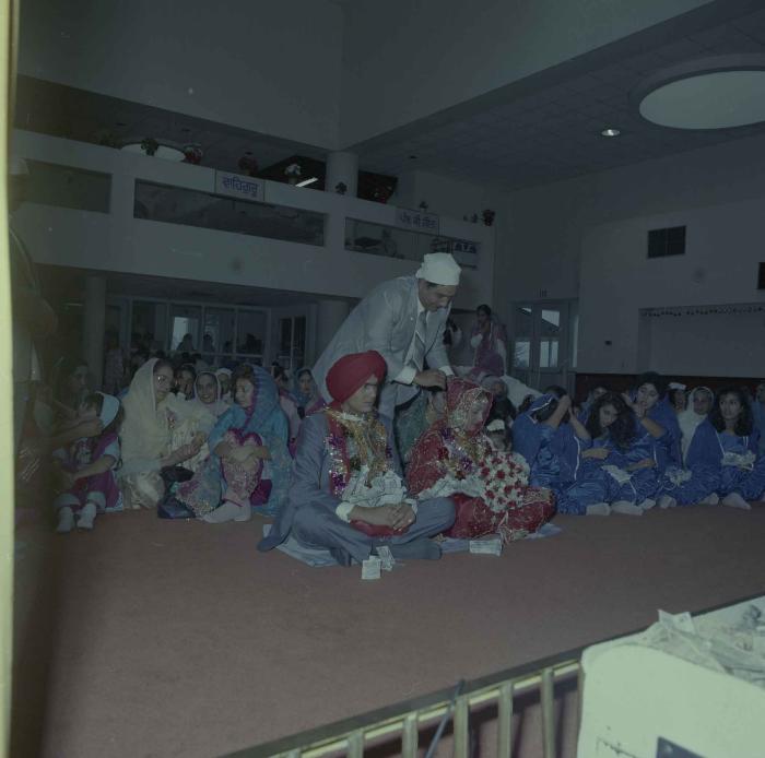 [Photo of Jaz Brar, Manpreet Brar and wedding guests]