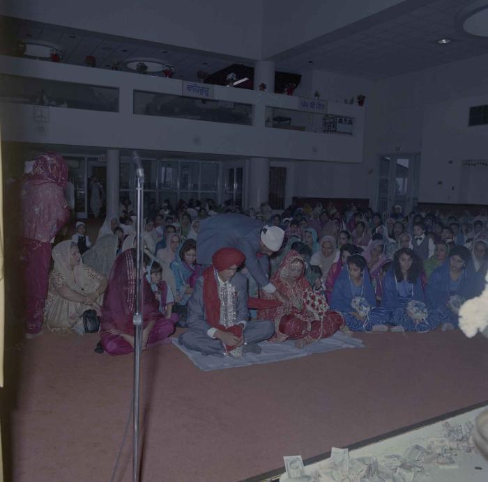 [Photo of Jaz Brar, Manpreet Brar and wedding guests]