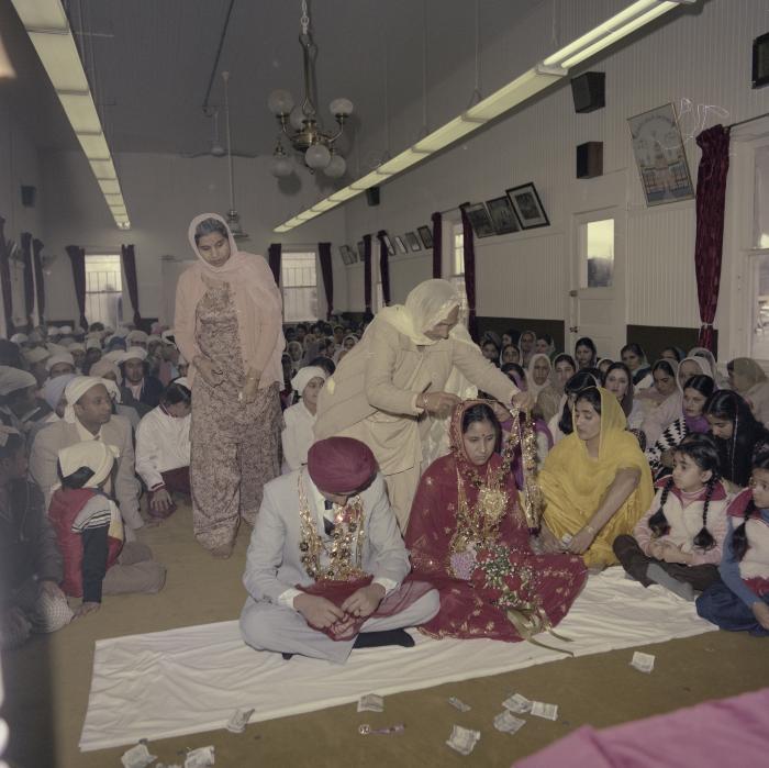 [Photo of Inderjeet Guran, Basant Brar and wedding guests]