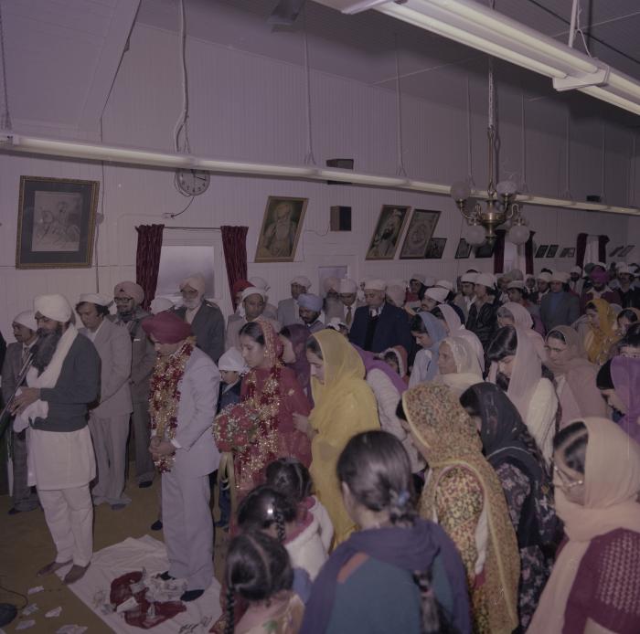 [Photo of Inderjeet Guran, Basant Brar and wedding guests]