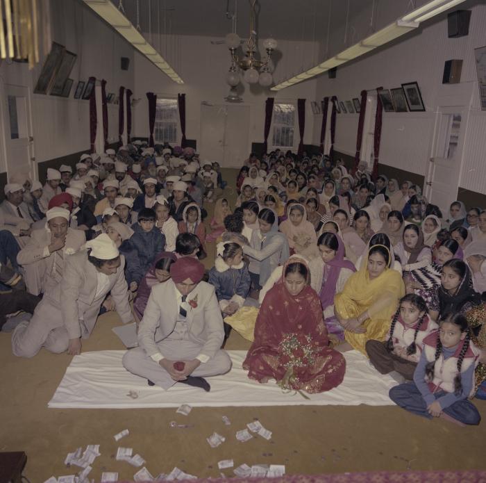 [Photo of Inderjeet Guran, Basant Brar and wedding guests]