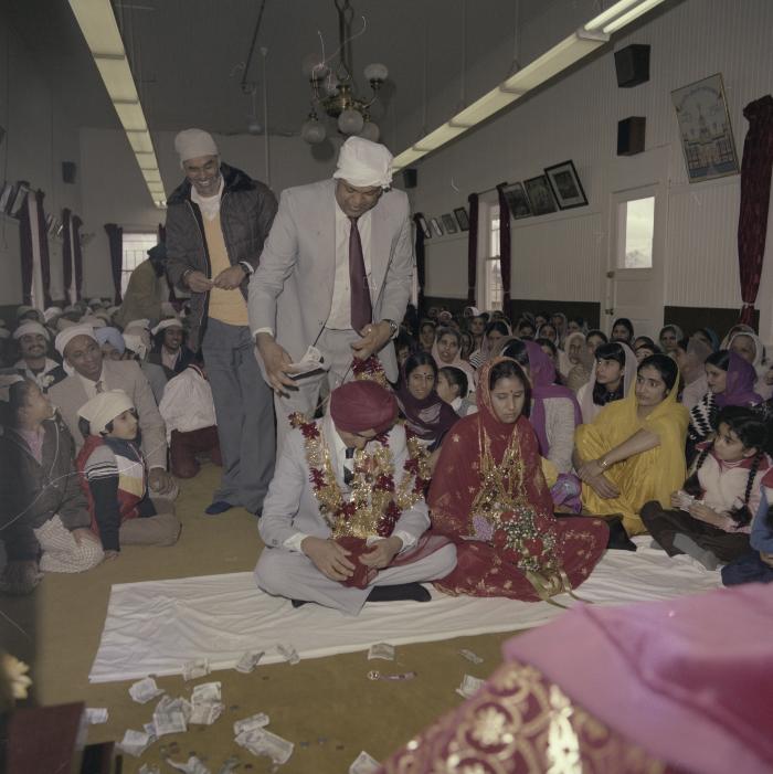 [Photo of Inderjeet Guran, Basant Brar and wedding guests]