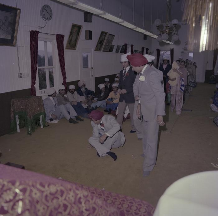 [Photo of Basant Brar and wedding guests]