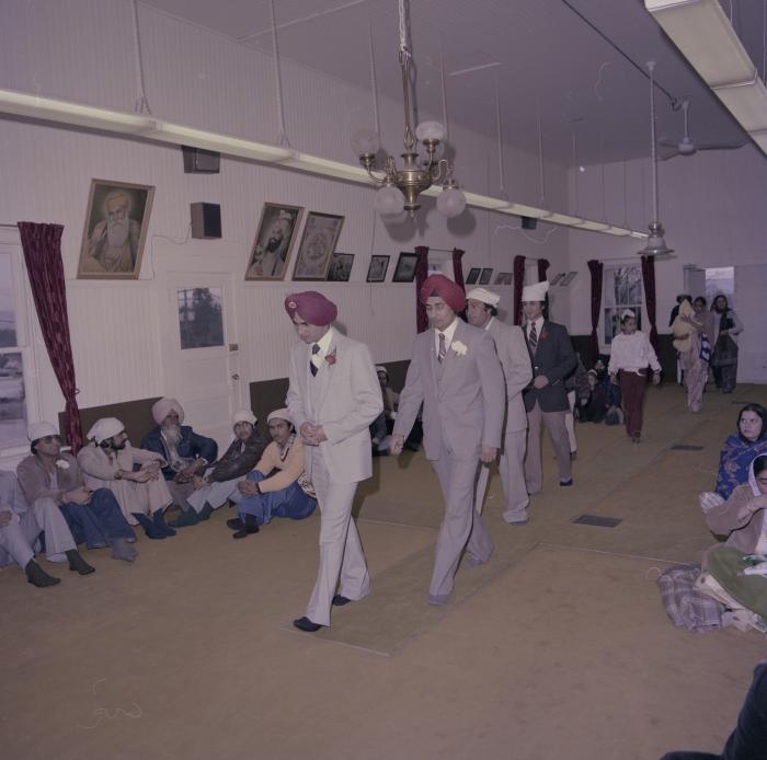 [Photo of Basant Brar and wedding guests]