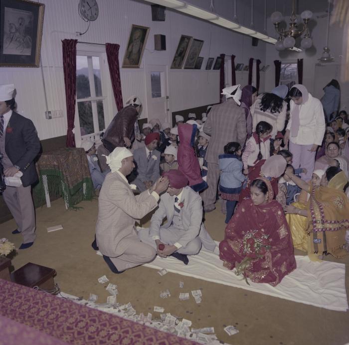 [Photo of Inderjeet Guran, Basant Brar and wedding guests]