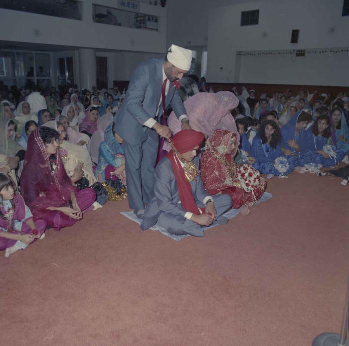 [Photo of Jaz Brar, Manpreet Brar and wedding guests]