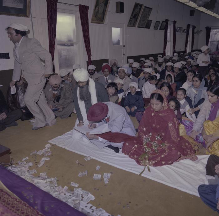 [Photo of Inderjeet Guran, Basant Brar and wedding guests]