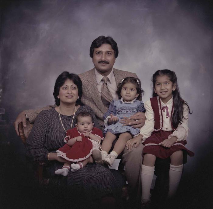 [Group portrait of Onkar Brar, Malkit Gill, and their children]
