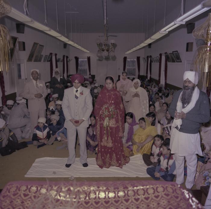 [Photo of Inderjeet Guran, Basant Brar and wedding guests]