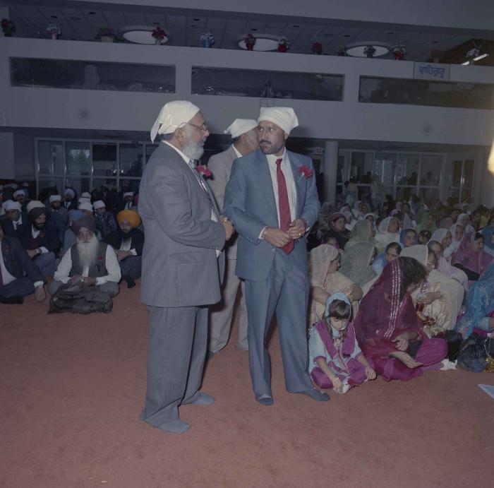 [Photo of unidentified wedding guests]
