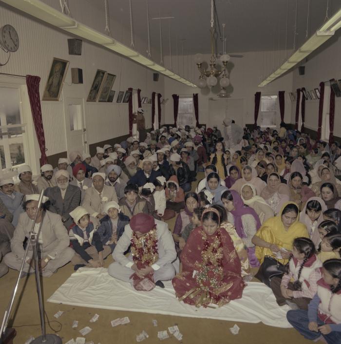 [Photo of Inderjeet Guran, Basant Brar and wedding guests]