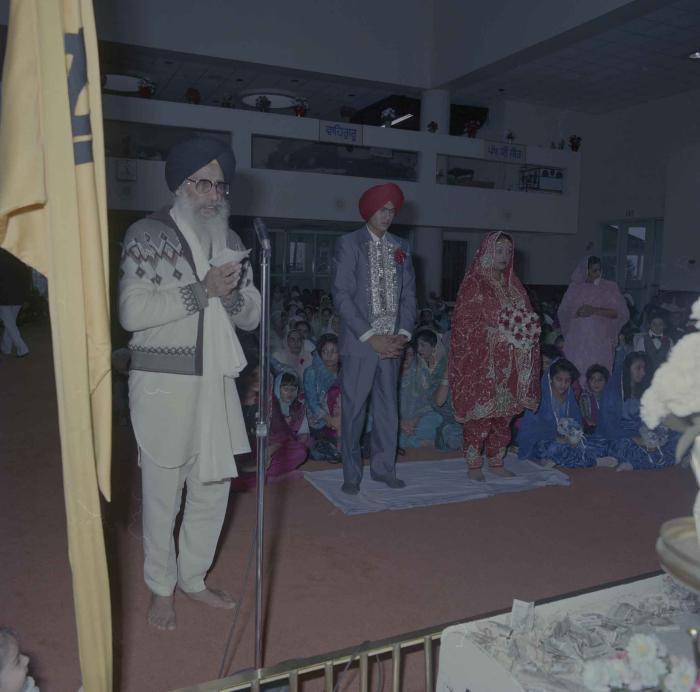 [Photo of Jaz Brar, Manpreet Brar and the Granthi]