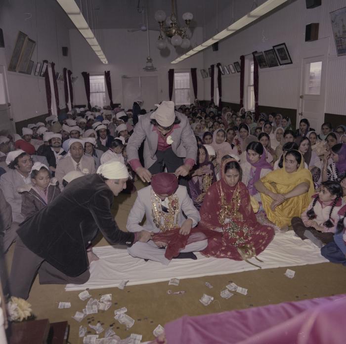 [Photo of Inderjeet Guran, Basant Brar and wedding guests]