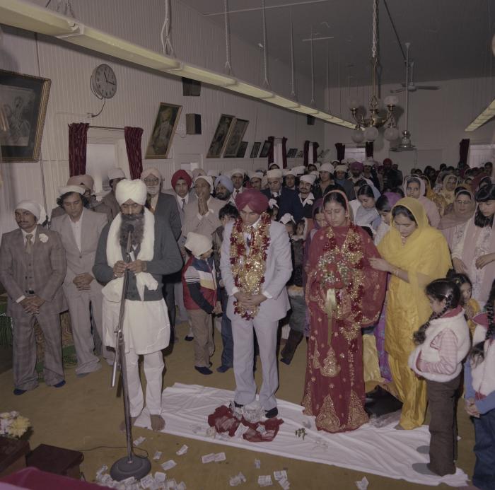 [Photo of Inderjeet Guran, Basant Brar and wedding guests]