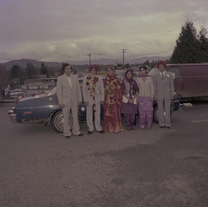 [Group photo of Inderjeet Guran, Basant Brar and wedding guests]