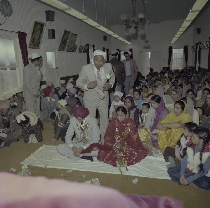 [Photo of Inderjeet Guran, Basant Brar and wedding guests]