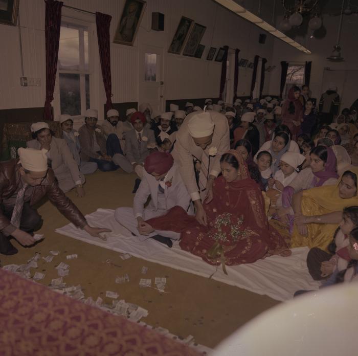 [Photo of Inderjeet Guran, Basant Brar and wedding guests]