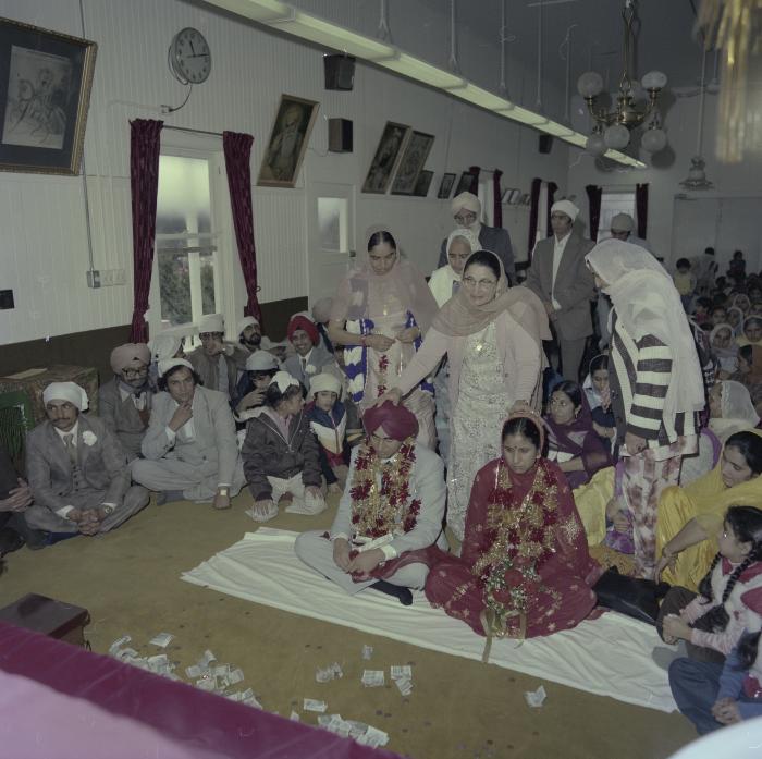 [Photo of Inderjeet Guran, Basant Brar and wedding guests]