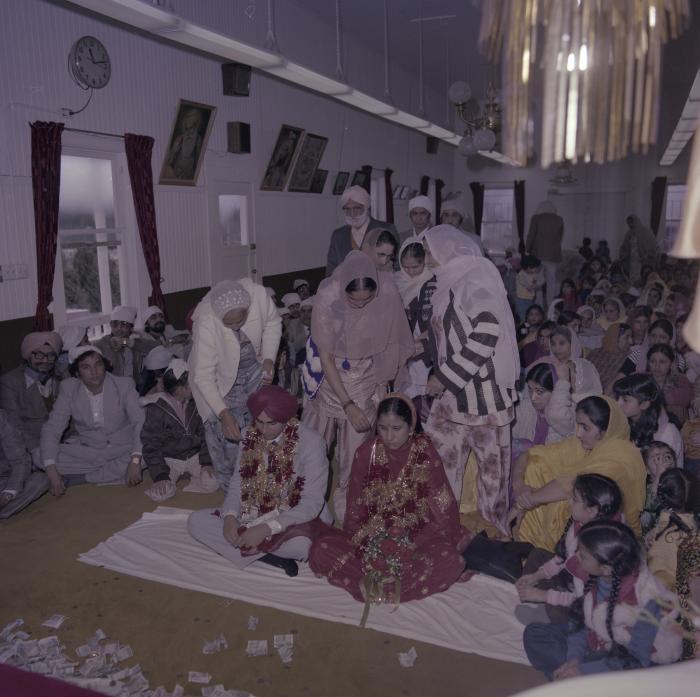 [Photo of Inderjeet Guran, Basant Brar and wedding guests]