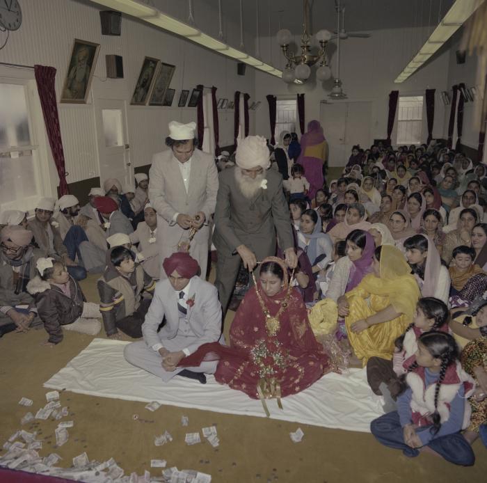 [Photo of Inderjeet Guran, Basant Brar and wedding guests]