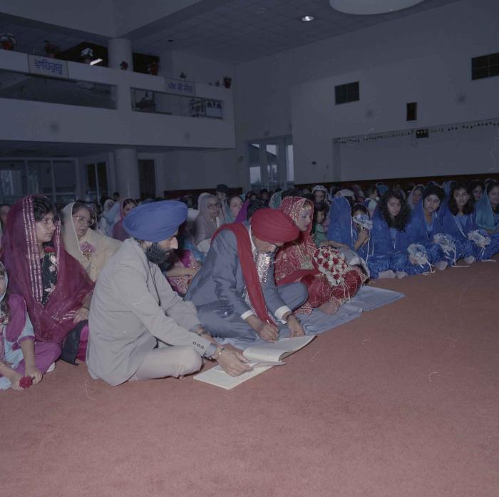 [Photo of Jaz Brar, Manpreet Brar and wedding guests]