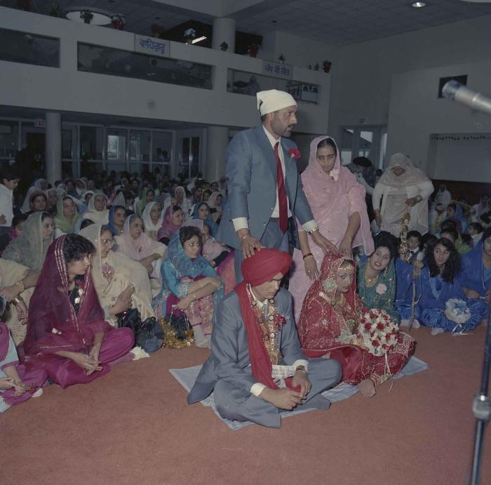 [Photo of Jaz Brar, Manpreet Brar and wedding guests]