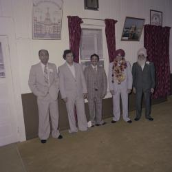 [Group photo of Basant Brar and four unidentified men]