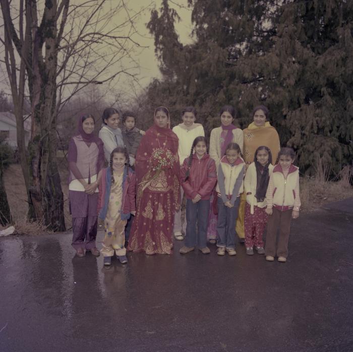 [Group photo of Inderjeet Guran and unidentified wedding guests]