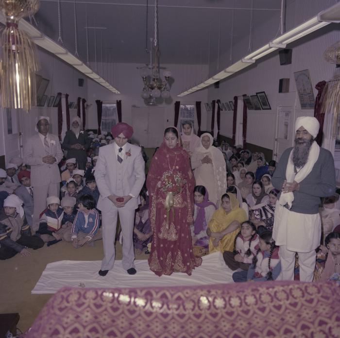 [Photo of Inderjeet Guran, Basant Brar and wedding guests]