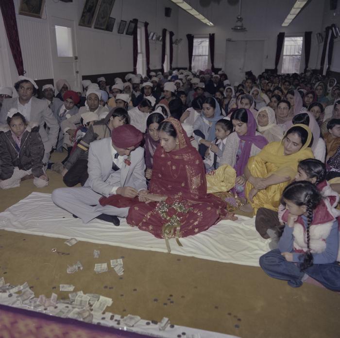 [Photo of Inderjeet Guran, Basant Brar and wedding guests]