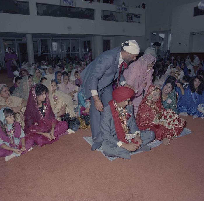 [Photo of Jaz Brar, Manpreet Brar and wedding guests]