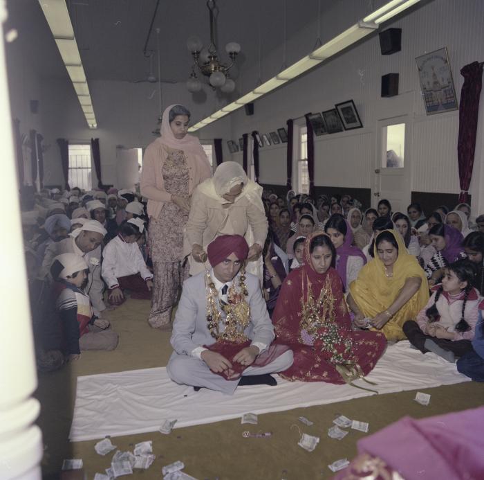 [Photo of Inderjeet Guran, Basant Brar and wedding guests]