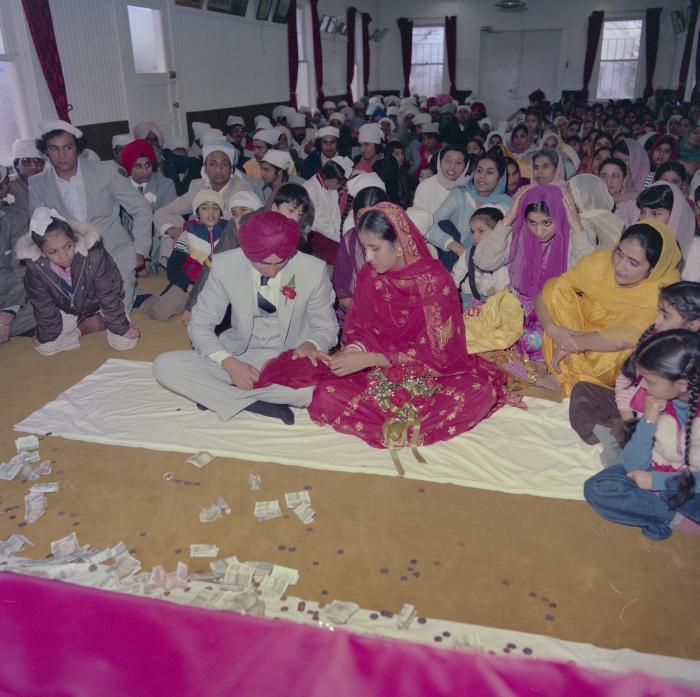 [Group photo of Inderjeet Guran, Basant Brar and wedding guests]