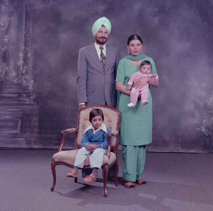 [Group portrait of Darshan Dhaliwal, an unidentified woman and two unidentified children]