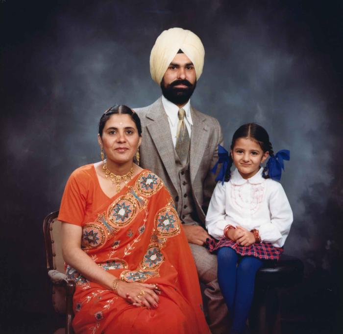 [Group portrait of Harpal Dhaliwal, an unidentified woman and an unidentified child]