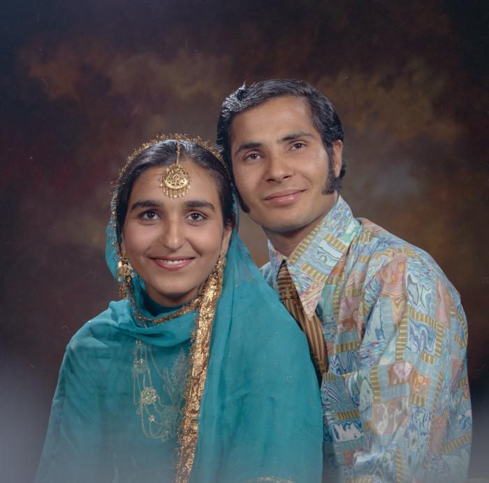 [Group portrait of Harlharn Dhaliwal and an unidentified woman]