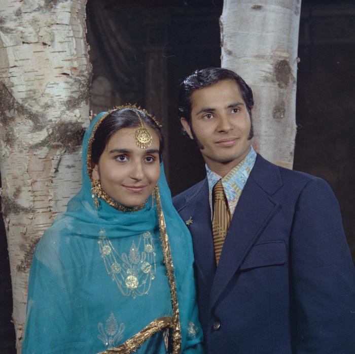 [Group portrait of Harlharn Dhaliwal and an unidentified woman]