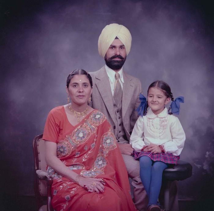 [Group portrait of Harpal Dhaliwal, an unidentified woman and an unidentified child]